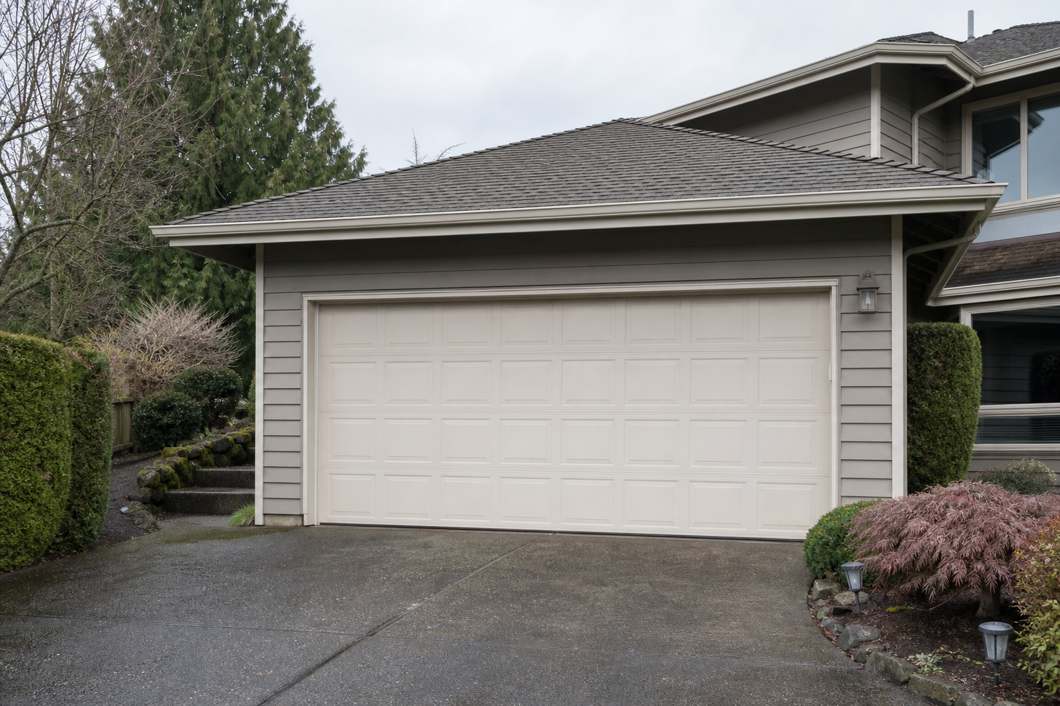 Kenmore home garage exterior with a visible garage door in soft Northwest light